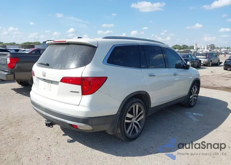 2016 Honda Pilot Touring z USA, uszkodzony, nr VIN 5FNYF5H93GB030459